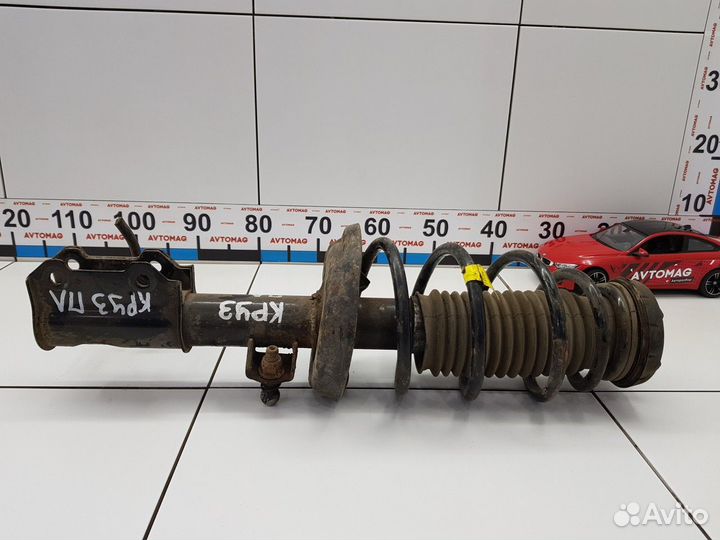 Амортизатор передний левый с пружиной