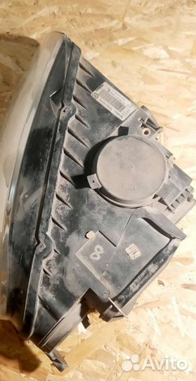 Фара передняя левая Volkswagen Touareg