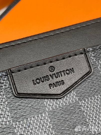 Кожаный клатч Louis Vuitton