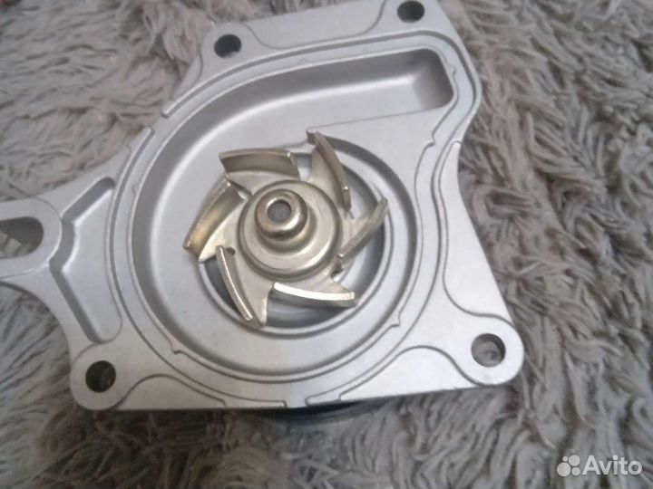 Помпа. mazda.ZJ.ZY