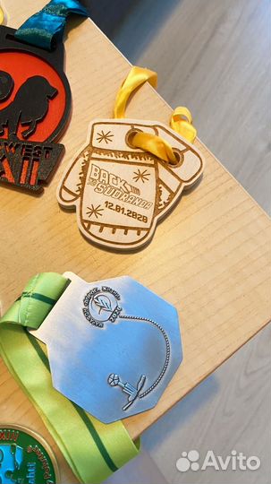 Медали с забегов и велозаездов