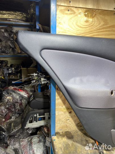 Обшивка задней левой двери Октавия Тур 79084