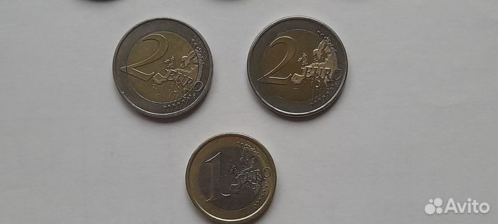 Монеты 1 евро и 2 евро