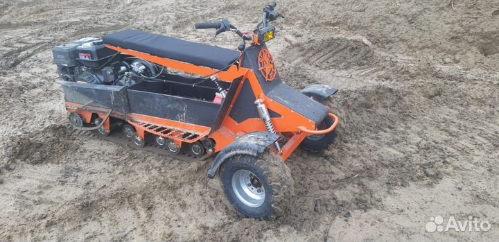 Мотобуксировщик с колесно лыжным модулем