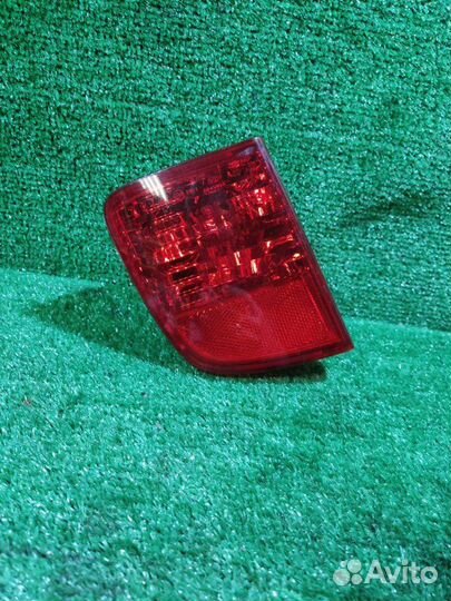 Фонарь задний в бампер левый Toyota Land Cruiser