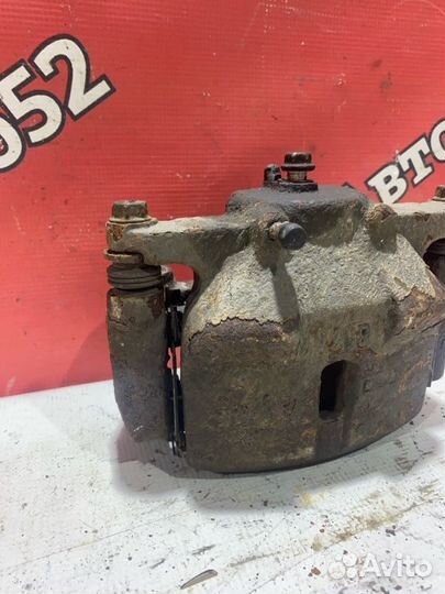 Суппорт тормозной передний правый Nissan X-Trail