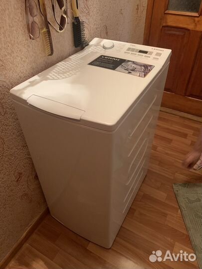 Стиральная машина с вертикальной загрузкой