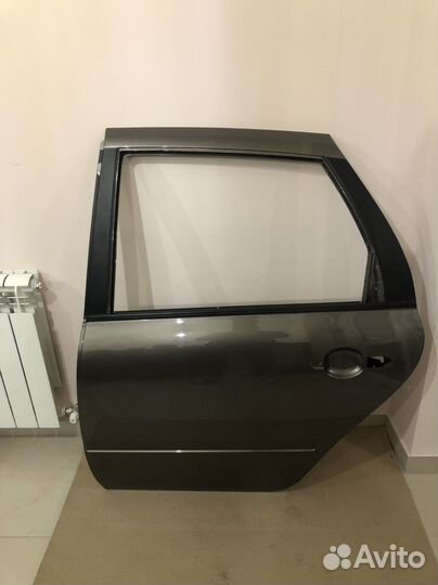 Дверь задняя левая лада грана
