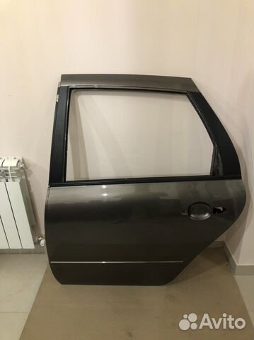 Дверь задняя левая лада грана