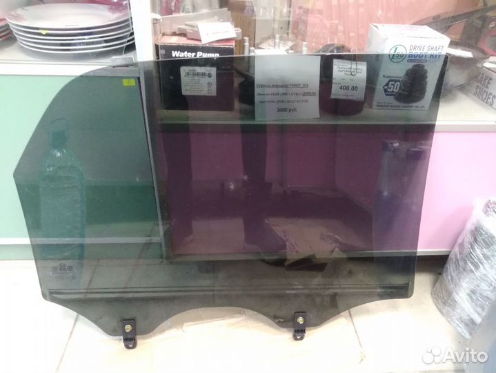 Стекло двери заднее левое Киа Спортаж 2009г