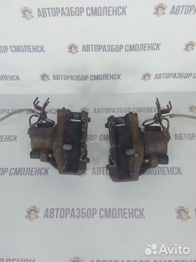 Суппорт тормозной передний Audi A6 C5 (1997—2001)