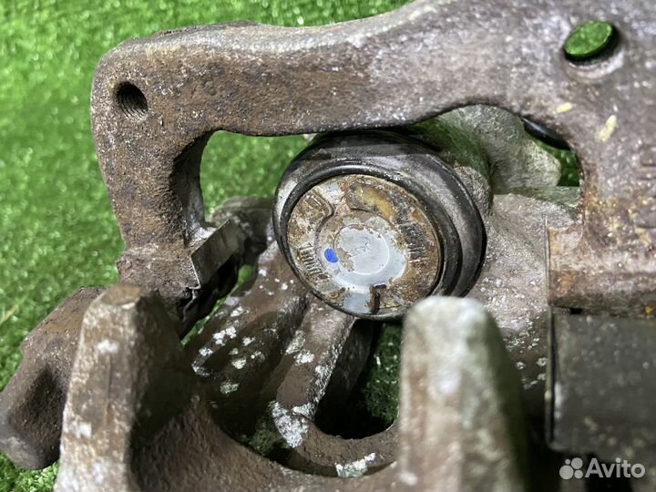 Суппорт тормозной задний левый Peugeot 308