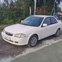 Mazda Familia 2.0 AT, 1999, 300 000 км, с пробегом, цена 180 000 руб.