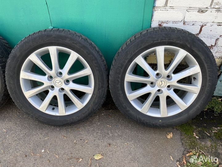 Диски mazda r17 с зимними шинами (шипы)