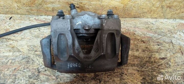 Суппорт тормозной передний левый Mercedes-Benz