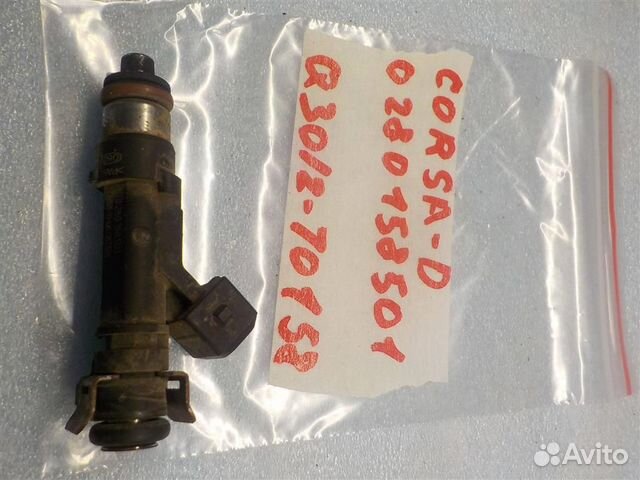 Форсунка инжекторная электрическая Opel Corsa D 2