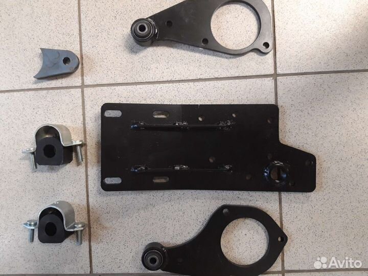 Отвязка переднего моста нива