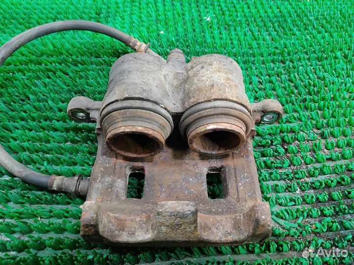 Суппорт тормозной передний левый Subaru Legacy/ O