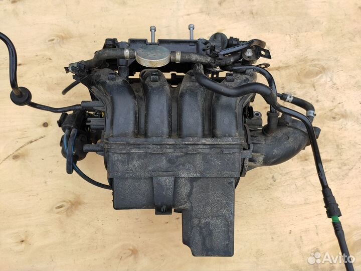 Впускной коллектор Z16XE1 на Opel Astra H Zafira B