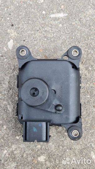 Моторчик заслонки отопителя Астра G Зафира А