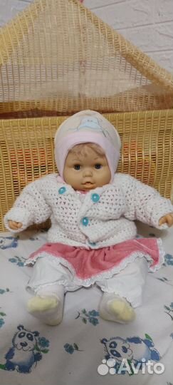 Кукла в кроватке