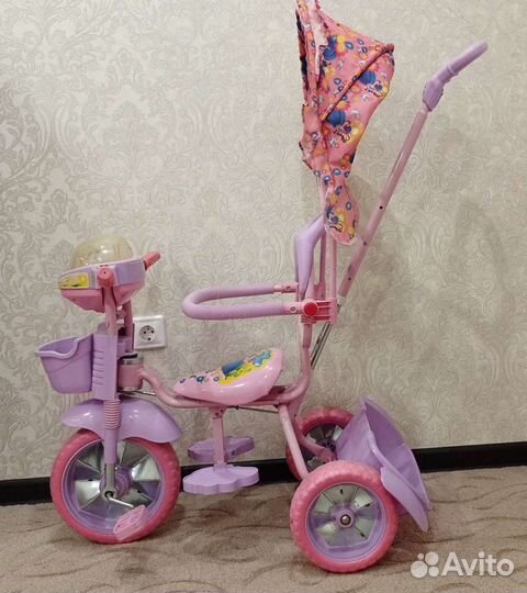 Трехколесный велосипед с ручкой для девочки