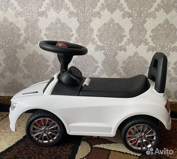 Машинка каталка полесье