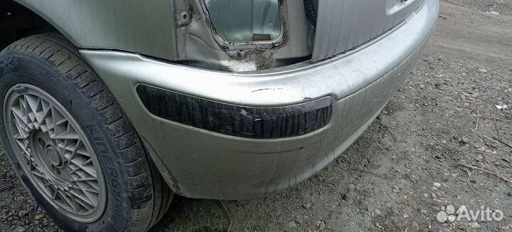 Задний бампер Nisan march k11