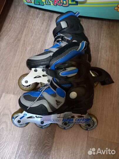 Роликовые коньки