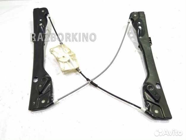 Стеклоподъемник электрический передний левый 7T4Z7