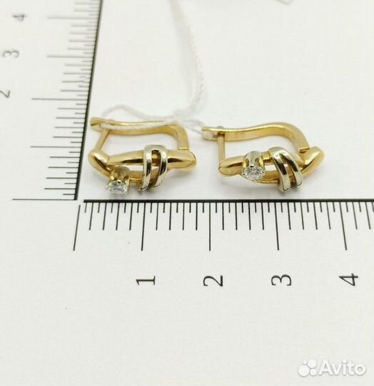 Золотые серьги с камнем