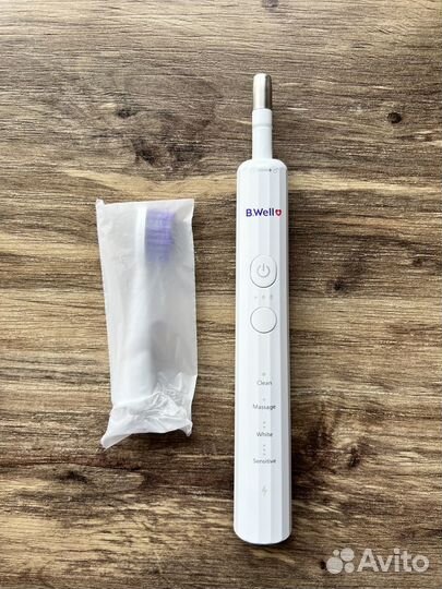 Электрическая зубная щетка