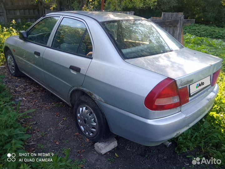 Mitsubishi Lancer 1.3 МТ, 1997, битый, 210 000 км