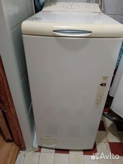 Стиральная машина с вертикальной загрузкой