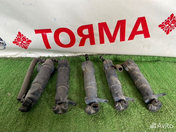 Форсунка омывателя фары левая Mercedes E-Class