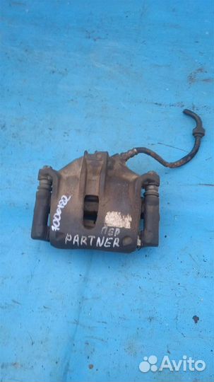 Суппорт тормозной передний левый Peugeot Partner