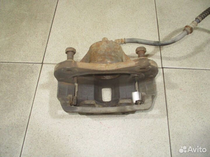 Суппорт передний правый Kia Sportage 2 (KM)