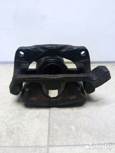 Суппорт тормозной передний правый Renault Laguna 1