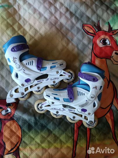 Роликовые коньки