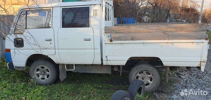 Nissan Atlas бортовой, 1989