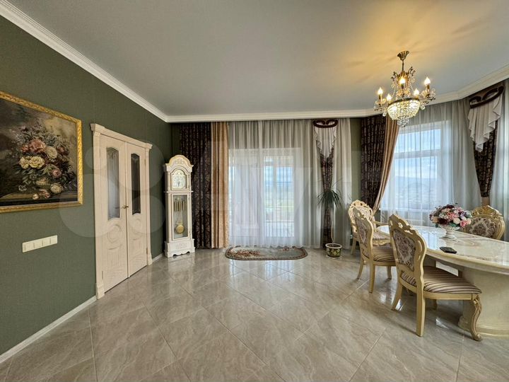 Коттедж 273,8 м² на участке 15 сот.