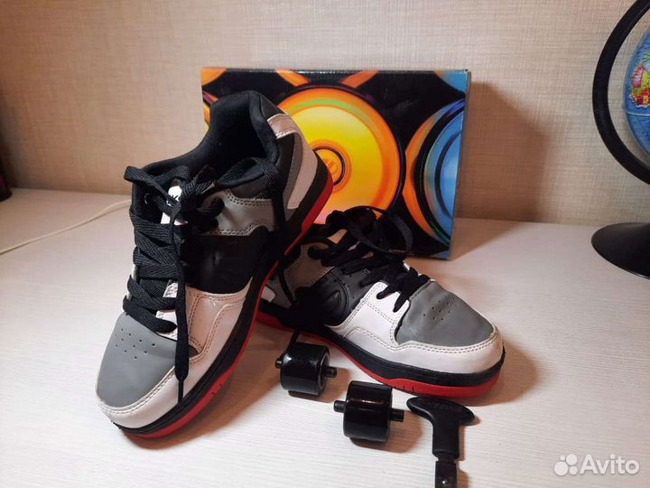 Роликовые кроссовки б/у