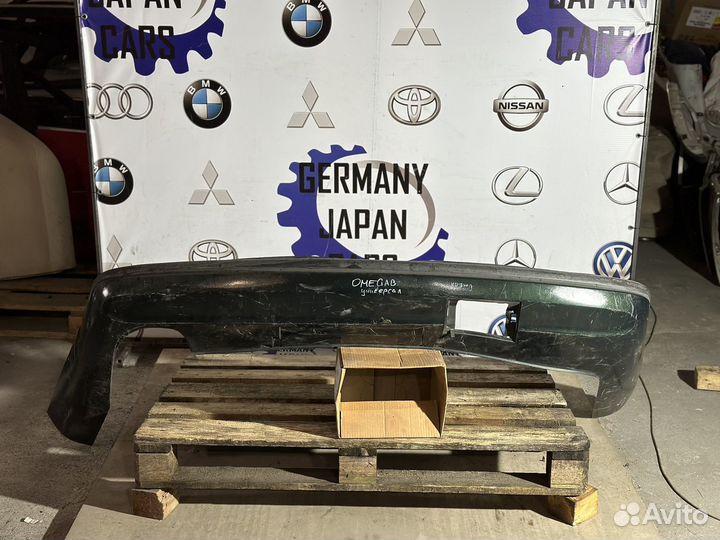 Задний бампер Opel Omega B универсал