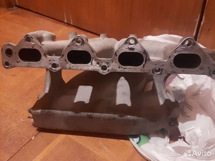 Коллектор впускной и выпускной на деву нексия