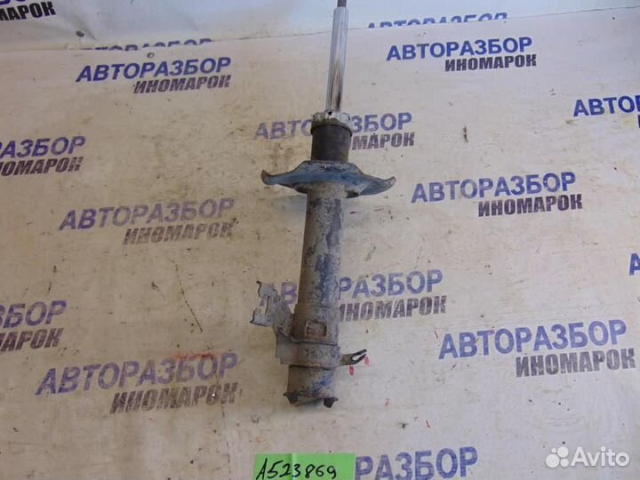 Амортизатор передний левый для Nissan Almera 2 20