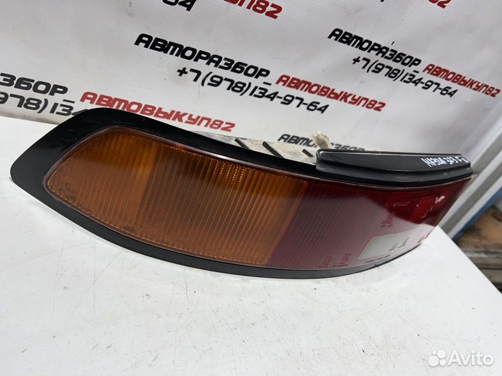 Фонарь задний левый Mazda 323f bg