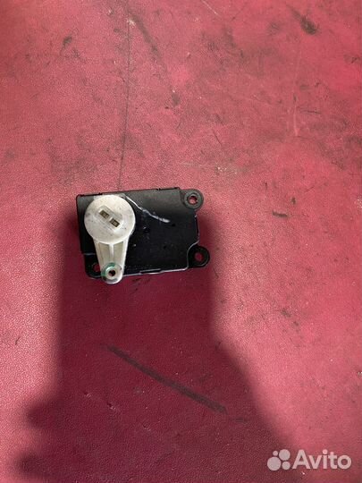Моторчик заслонки отопителя Nissan Tiida