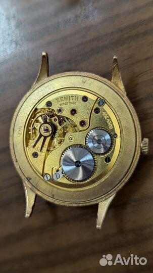 Золотые часы Zenith