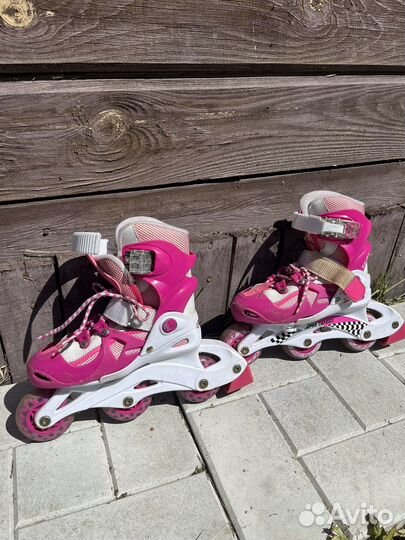 Роликовые коньки