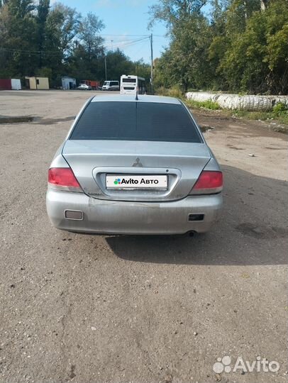 Mitsubishi Lancer 1.3 МТ, 2004, 180 000 км